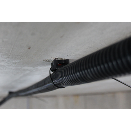 Close up of cable tie installation on concrete