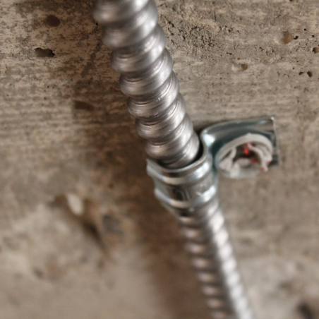 Close up application image of a MC cable clip PFT installation