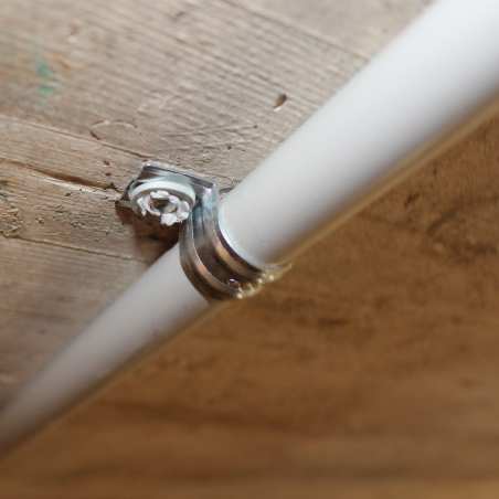 Close up application image of a MC cable clip PFT installation