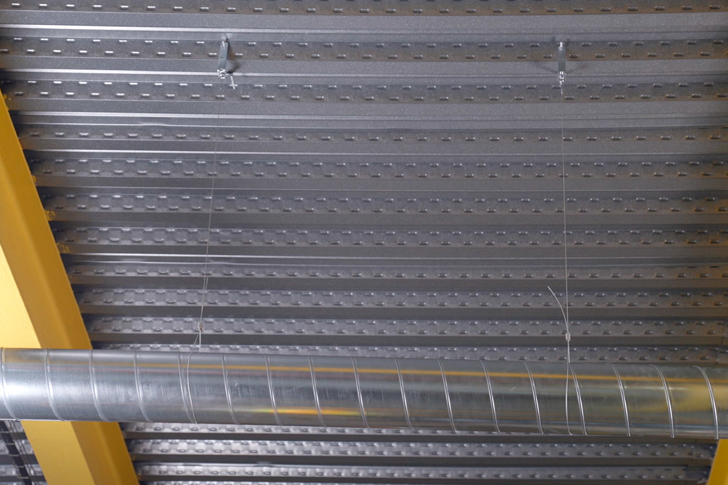 An HVAC system suspended via the EWFS cable system